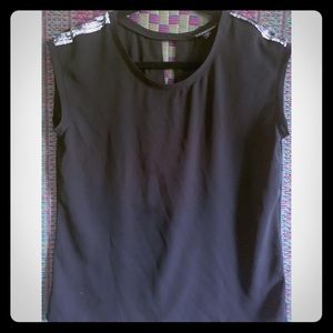 Sleeveless black dress top